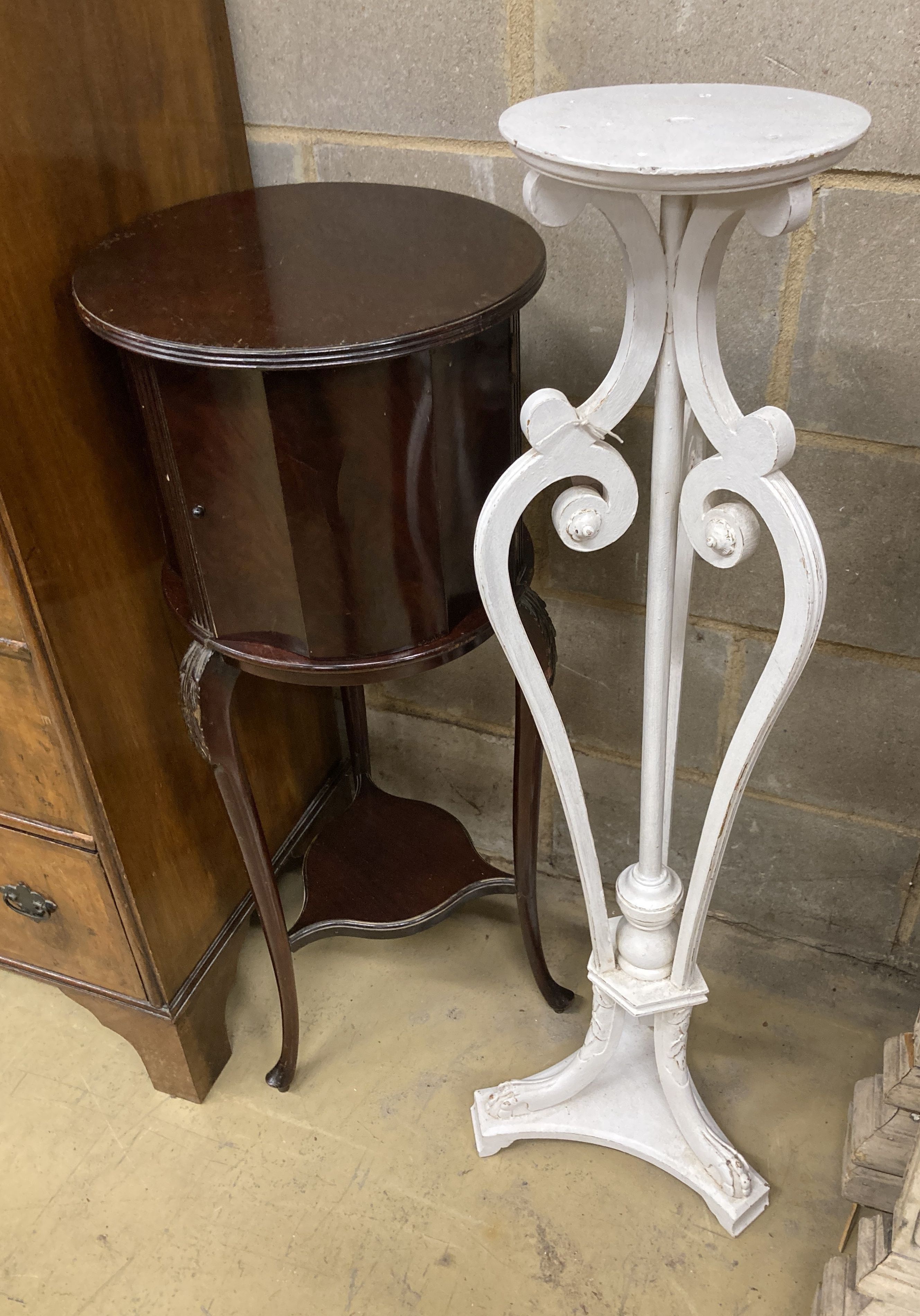 An Edwardian mahogany circular jardiniere stand, 34cm diameter, 89cm high together with a painted plant stand